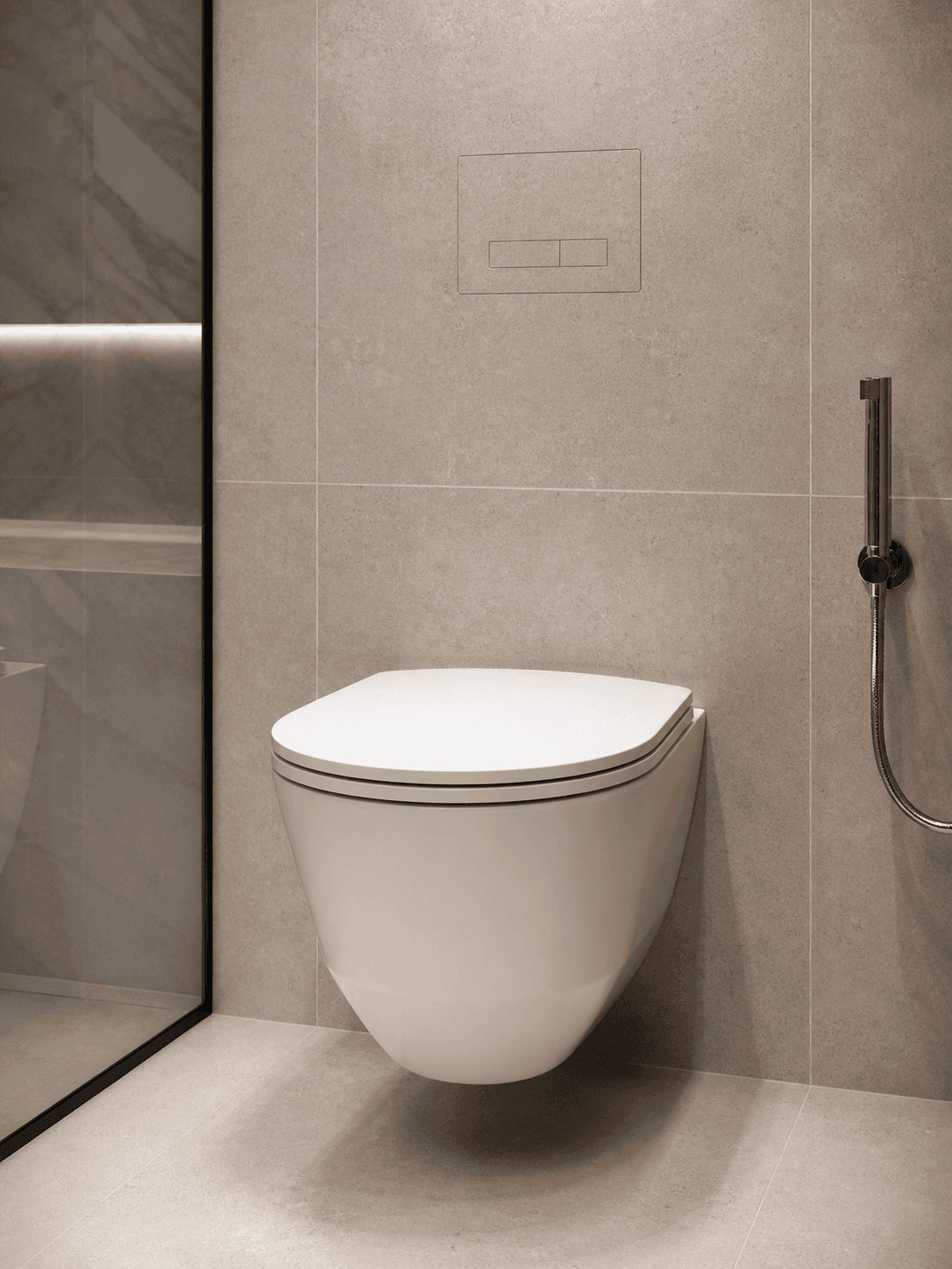 Hidden Flush Plate integrated into a beige stone tiled wall above a wall-hung toilet