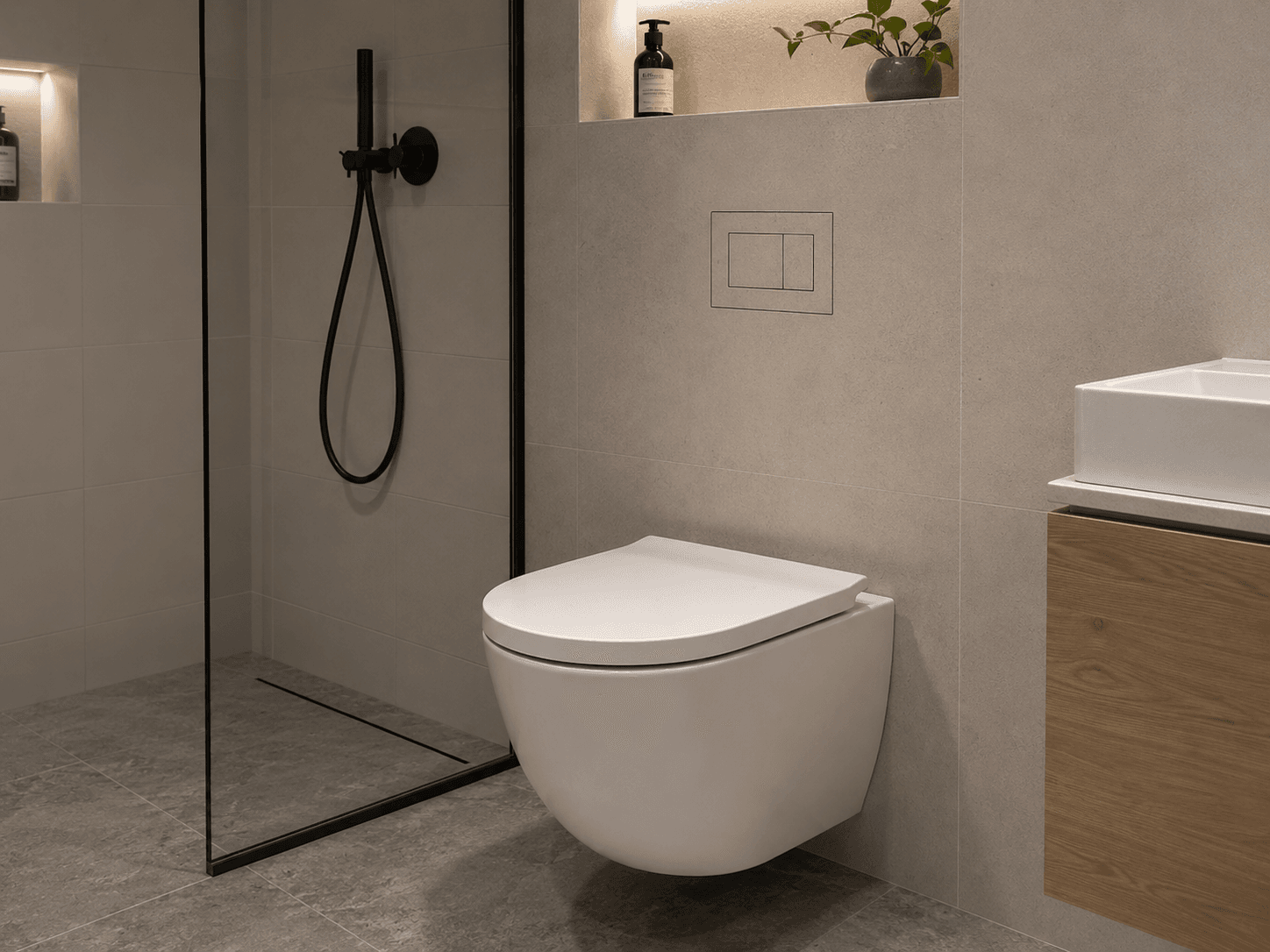 Bathroom with walk-in shower and the hidden flush plate above the wall-hung toilet